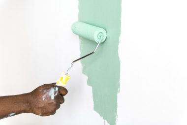 people-painting-house-wall